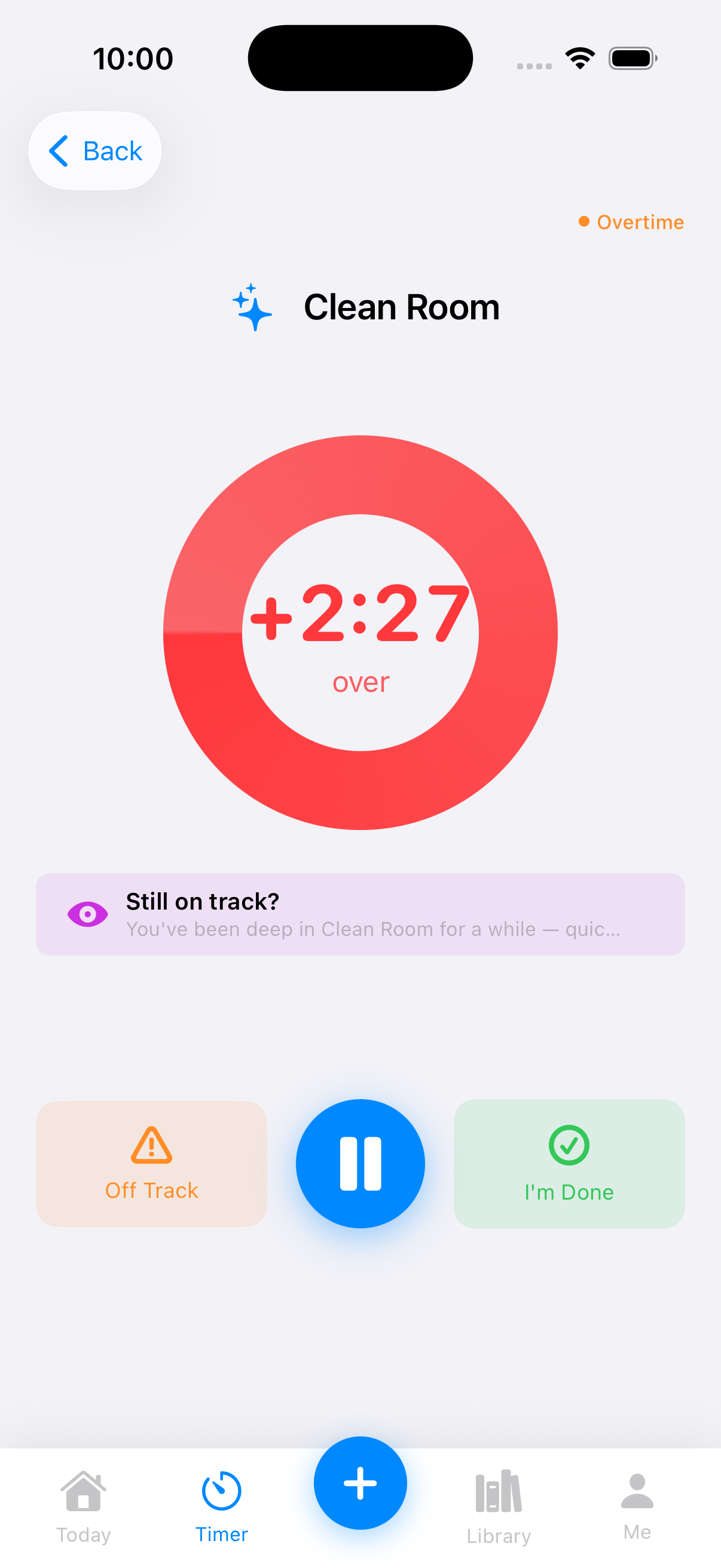 TimeNinja overtime timer with a soft purple Still on track check-in banner during a Clean Room session